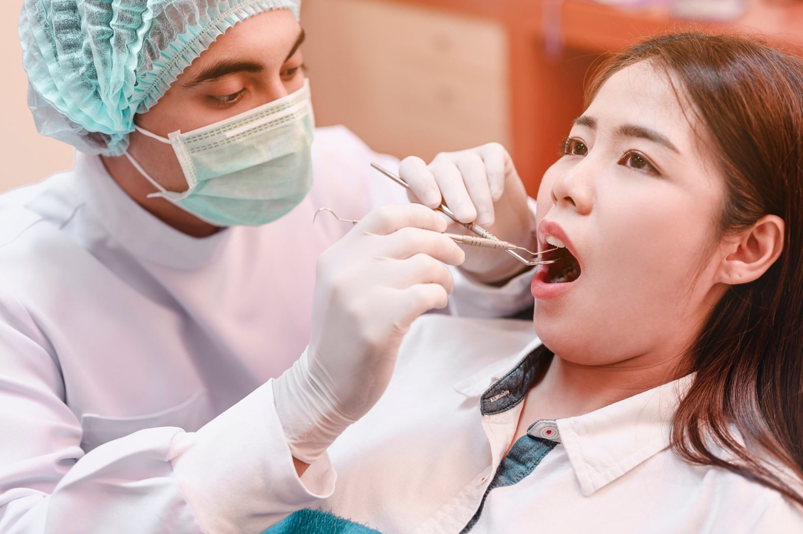 dentist examining teeth patients in clinic for be 2023 11 27 05 02 18 utc scaled